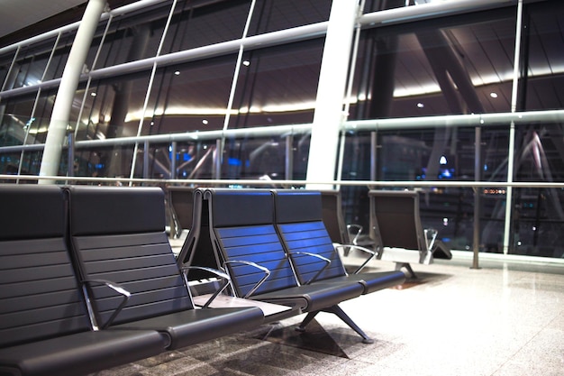 Empty passenger waiting seat in airport departure gate