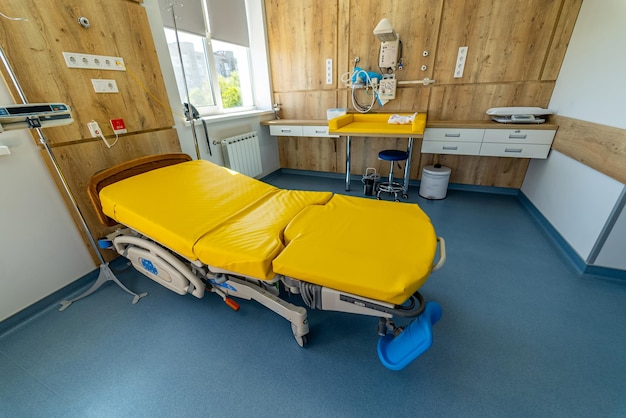 Empty patient beds in a maternity ward Modern light ward of maternity hospital