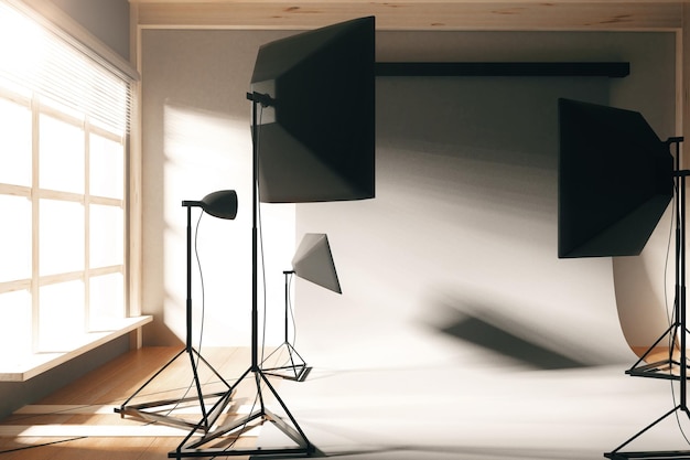 Empty photo studio with white background at sunrise