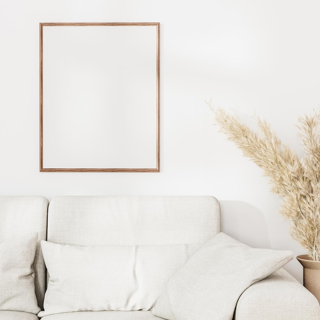 Photo empty picture frame above gray sofa with dry pampas grass on white wall with sunlight 3d rendering