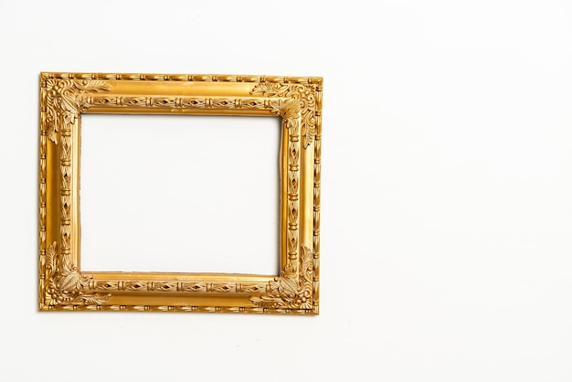 empty picture frame on white wall background with copy space