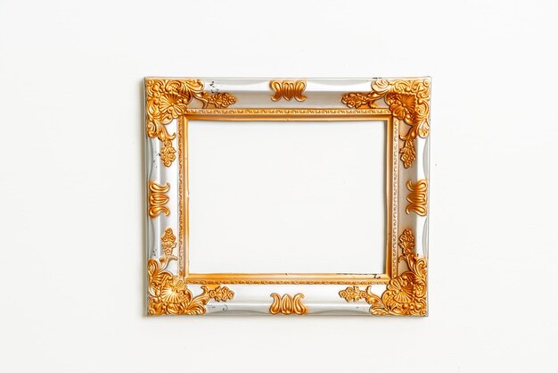 Empty picture frame on white wall background