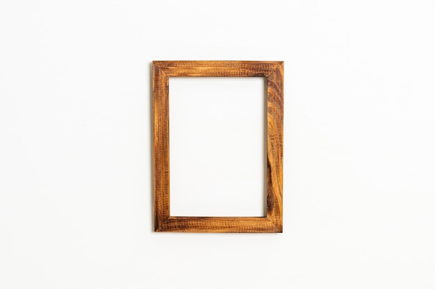 Photo empty picture frame on white wall