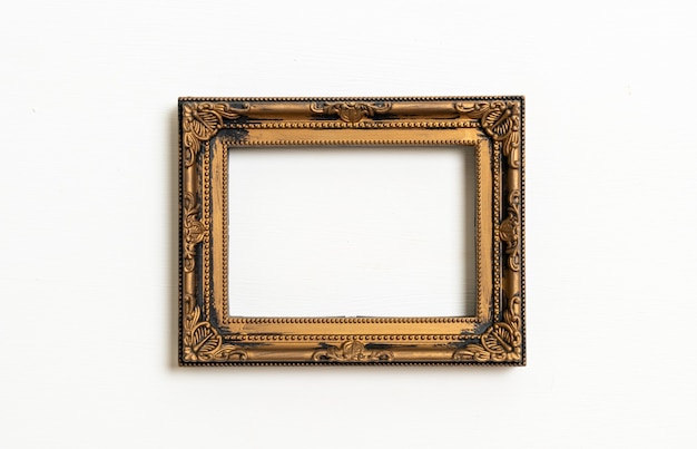 Photo empty picture frame on white wall