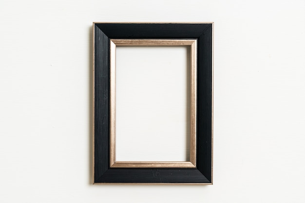 empty picture frame on white wall