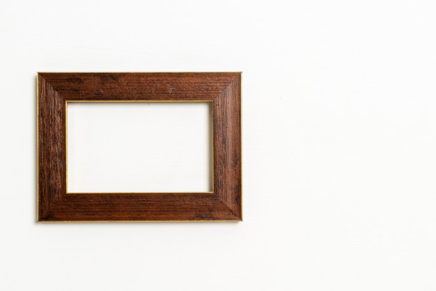 empty picture frame on white wall