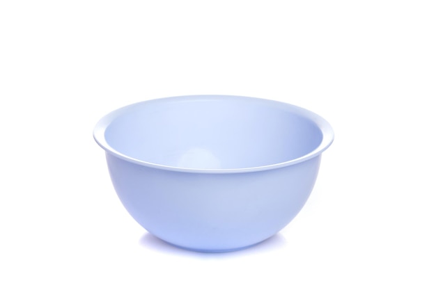 Empty plastic purple salad bowl on white isolated background