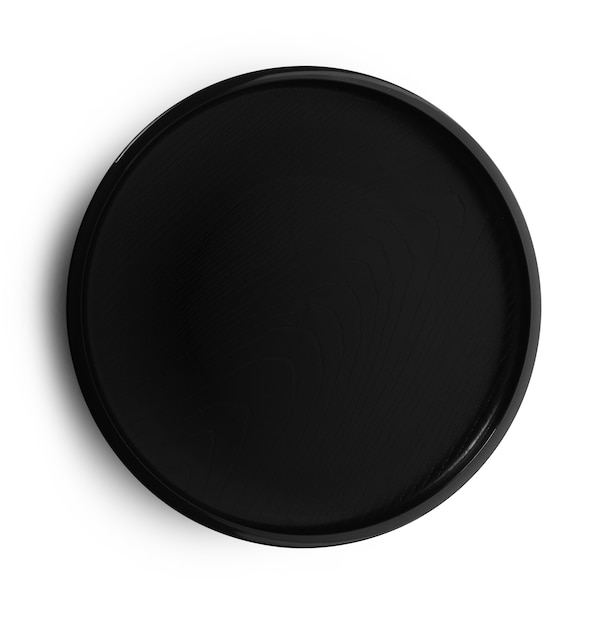 Empty plate on white surface.