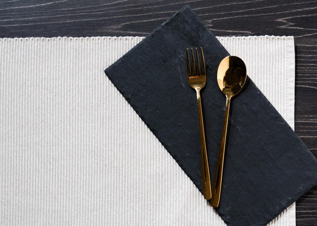 Empty plate with silver fork and Spoon dining dish copy space