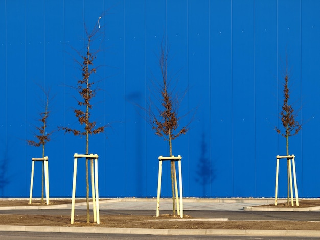 Empty playground against clear blue sky