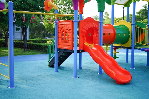 empty playground against trees in park