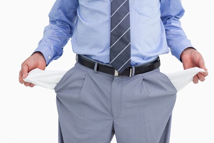 Photo empty pockets of tradesman being shown