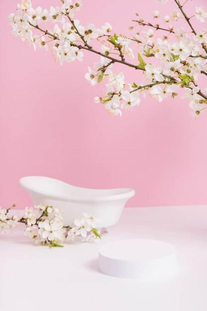 Empty podium or pedestal with spring bloom and bath spring mock up for cosmetic products