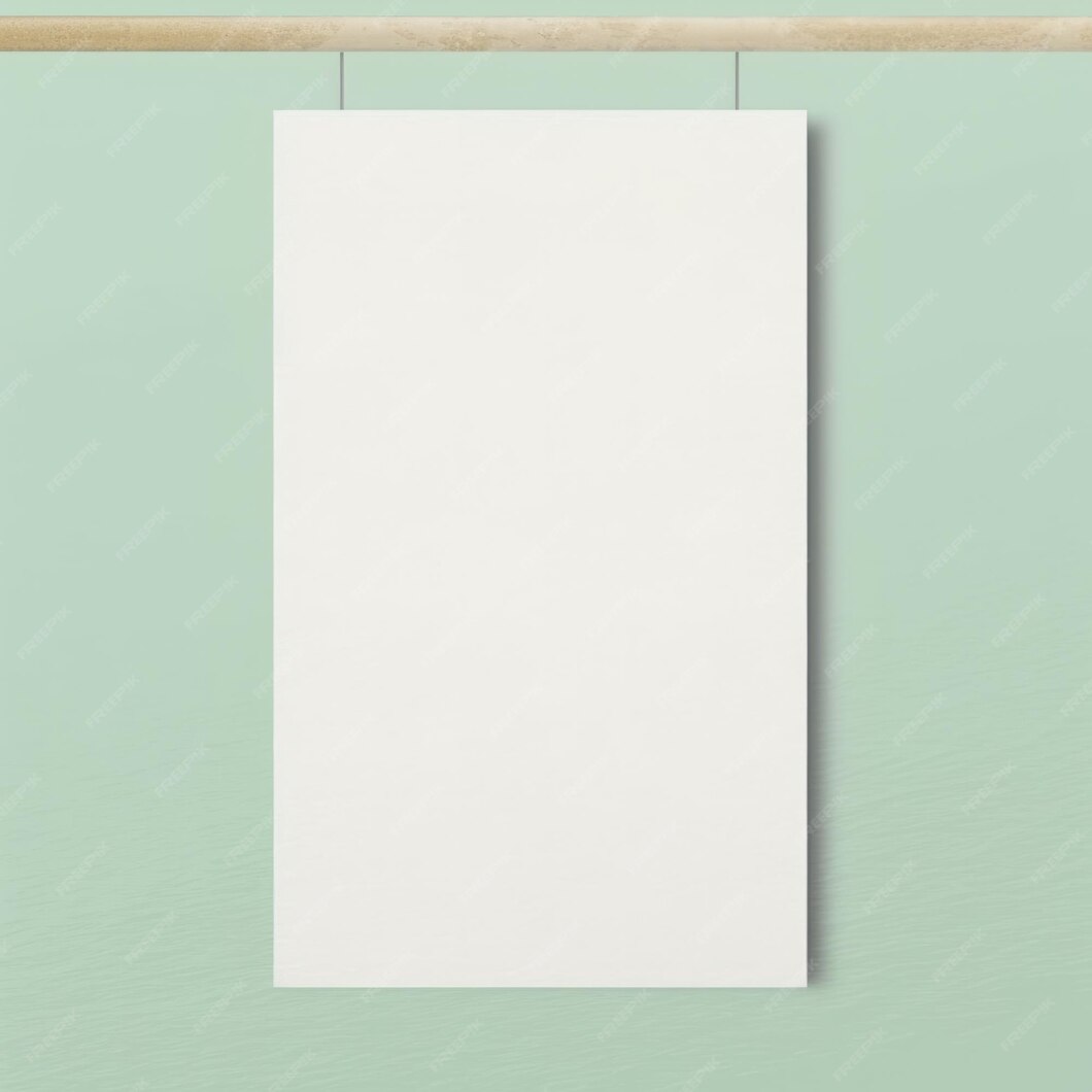 Premium Photo Empty poster template hanging on a soft colored wall