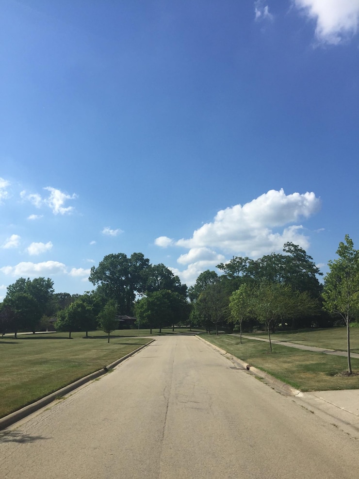Photo empty road against cloudy sky