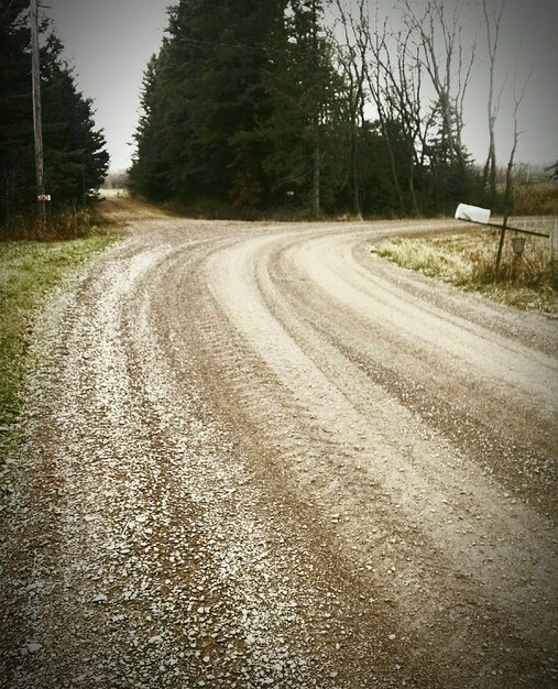 Empty road along landscape