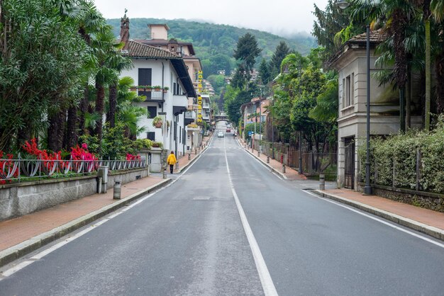 Empty road by building