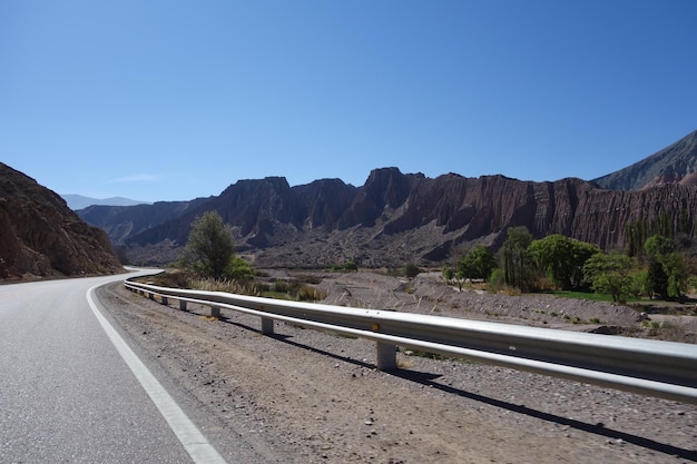 Empty road on desert landscape dry mountainous area road trip