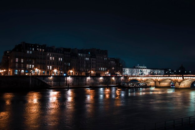 Empty road view from a Paris Street for design background during night