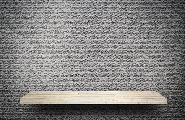 Empty rock stone shelf on gray carpet background