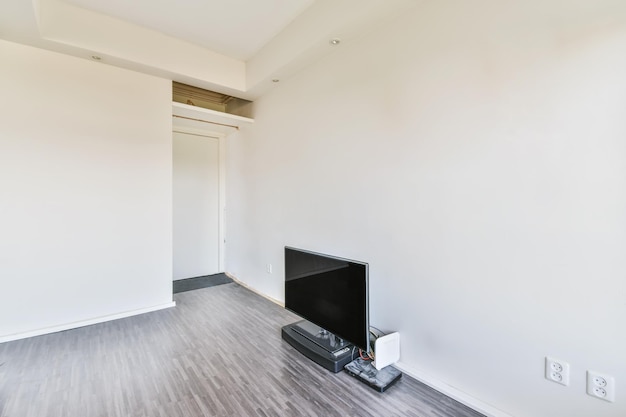 Empty room with gray parquet