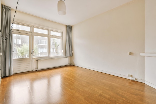 Empty room with window and radiator