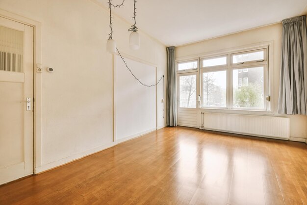 Empty room with window and radiator