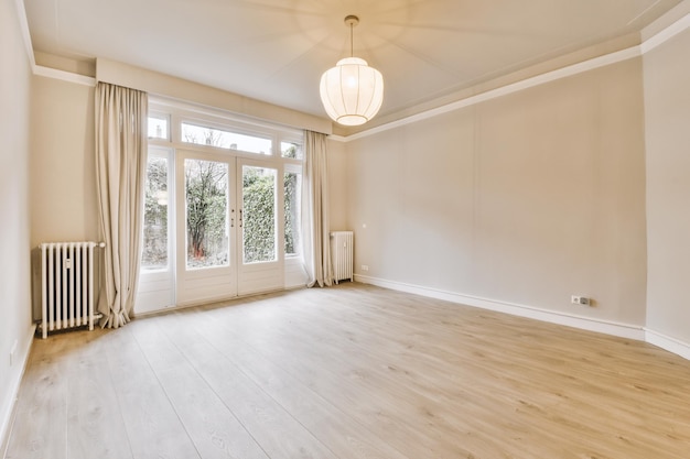 Empty room with window and radiator