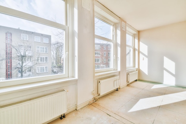 Empty room with window and radiator