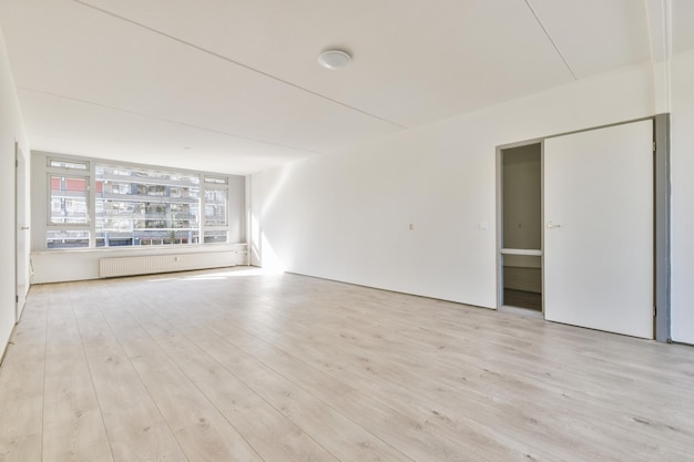 Empty room with window and radiator