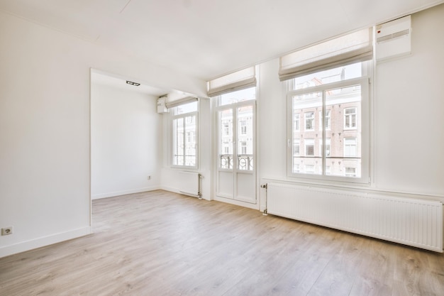 Empty room with window and radiator