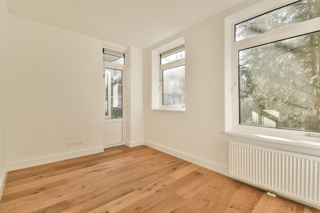 Empty room with window and radiator