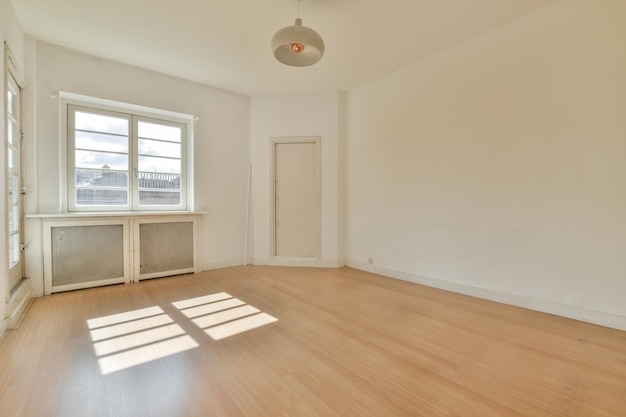 Empty room with window and radiator