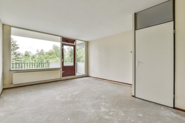 Empty room with window and radiator