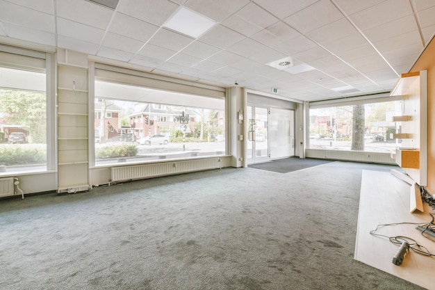 Empty room with window and radiator