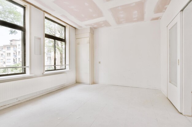 Empty room with window and radiator