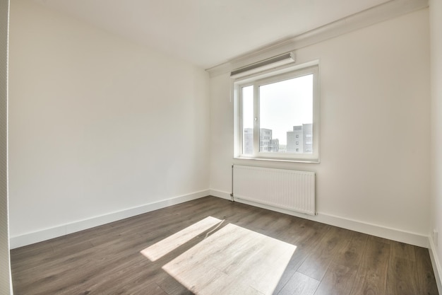 Empty room with window and radiator