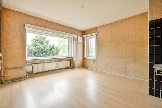 Empty room with window and radiator