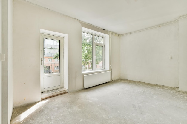 Empty room with window and radiator