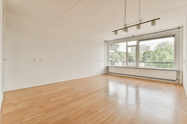 Empty room with window and radiator