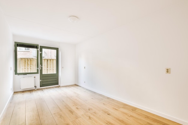 Empty room with window and radiator