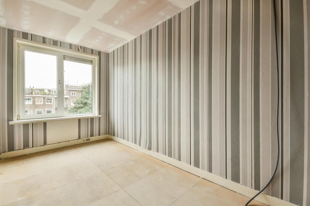 Empty room with window and radiator