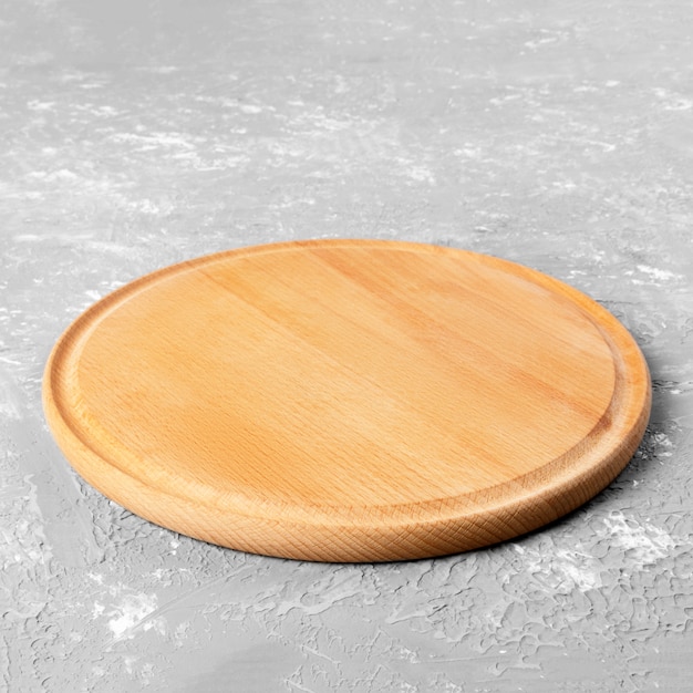 Empty round wooden plate 