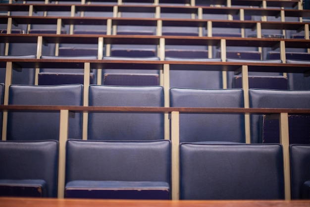 Empty row of desk in lecture hall