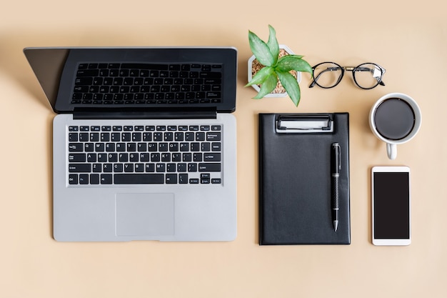 Empty screen Smart phone and file folder on business desk office with copy space, Top view