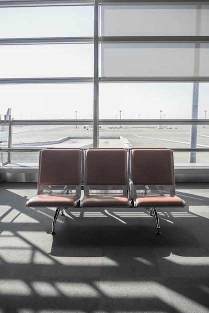 Photo empty seats at airport waiting area