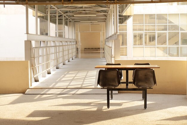 Empty seats in building on sunny day