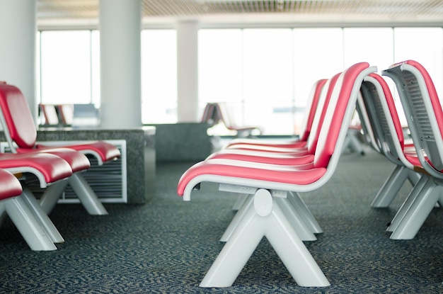 Photo empty seats in row at airport departure area