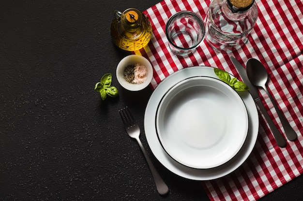 Empty set of plates on a table