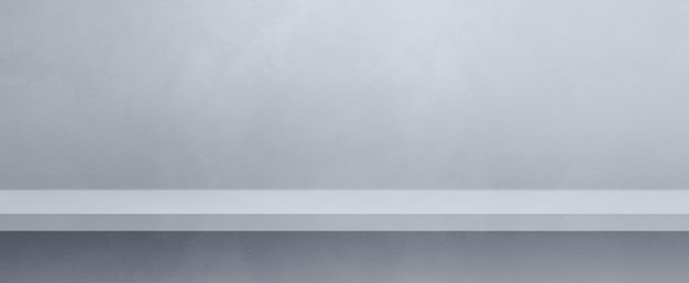 Empty shelf on a light grey concrete wall Background template Horizontal banner mockup